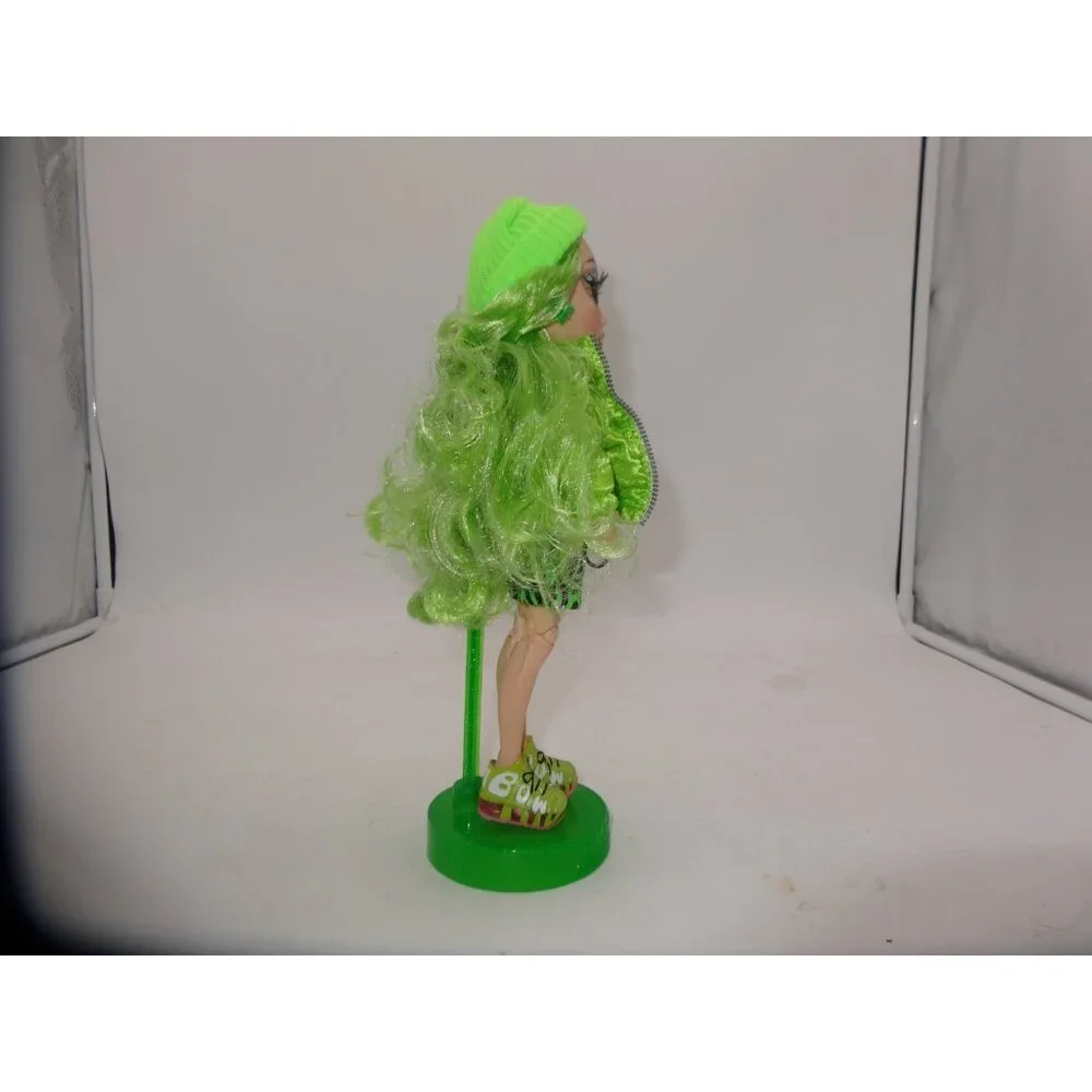 Rainbow High Jade Hunter Fashion Doll Dressed in Shorts Hat Jacket Top and Stand